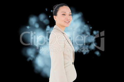 Composite image of smiling asian businesswoman