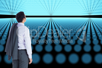 Composite image of businessman standing