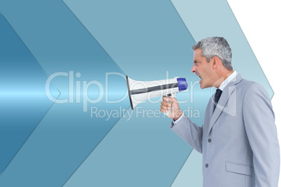 Composite image of businessman shouting in loudspeaker