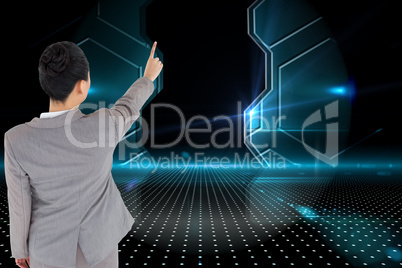 Composite image of asian businesswoman pointing