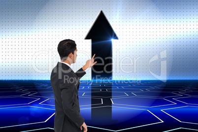 Composite image of unsmiling asian businessman pointing