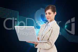 Composite image of confident businesswoman holding laptop