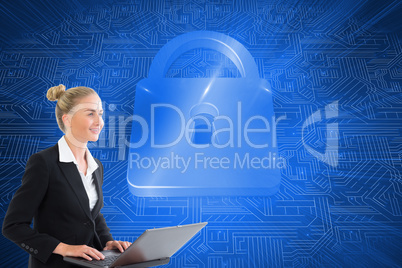 Composite image of businesswoman using laptop