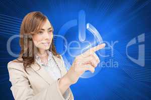 Composite image of businesswoman pressing an invisible key