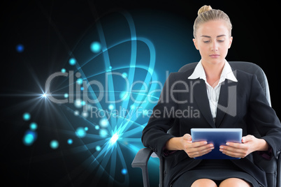 Composite image of businesswoman sitting on swivel chair with ta