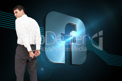 Composite image of businessman wearing handcuffs