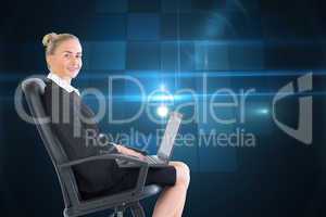 Composite image of businesswoman sitting on swivel chair with la