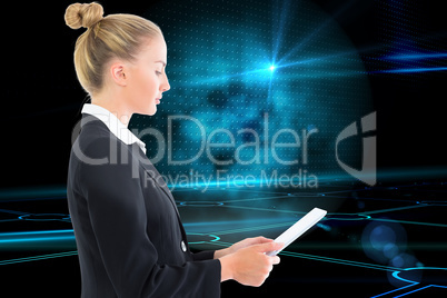 Composite image of businesswoman holding tablet