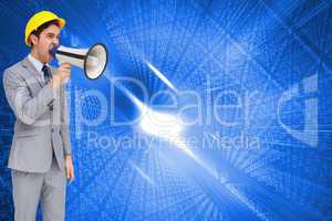 Composite image of young architect yelling with a megaphone