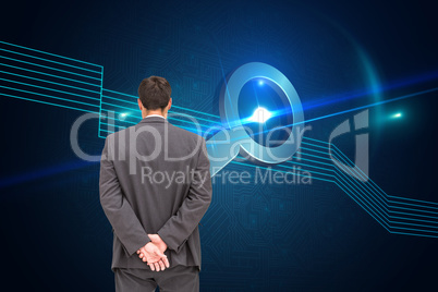 Composite image of rear view of classy businessman posing