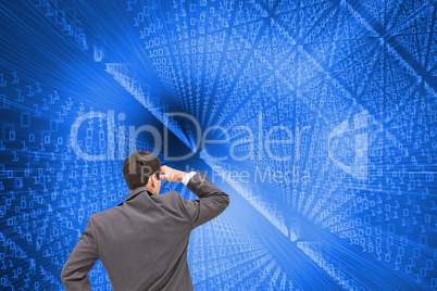 Composite image of businessman standing hand on hip Composite image of businessman standing hand on hip