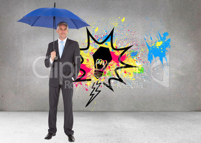 Composite image of businessman smiling at camera and holding blu