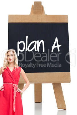 Composite image of elegant blonde standing hands on hips