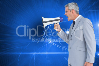 Composite image of businessman shouting in loudspeaker