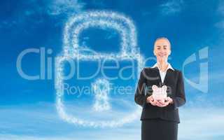 Composite image of businesswoman holding pink piggy bank