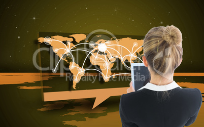 Composite image of businesswoman holding new tablet