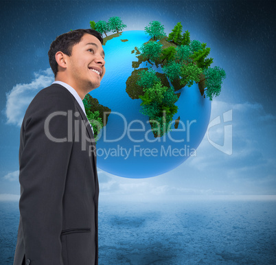 Composite image of smiling asian businessman