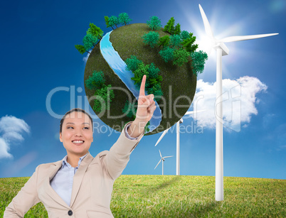 Composite image of smiling asian businesswoman pointing