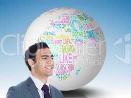 Composite image of smiling businessman standing