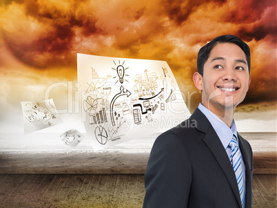 Composite image of smiling asian businessman