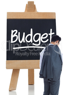 Composite image of businessman standing