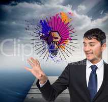 Composite image of smiling businessman touching