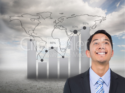 Composite image of smiling asian businessman