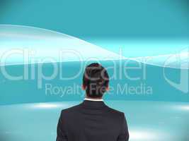 Composite image of businessman turning his back to camera