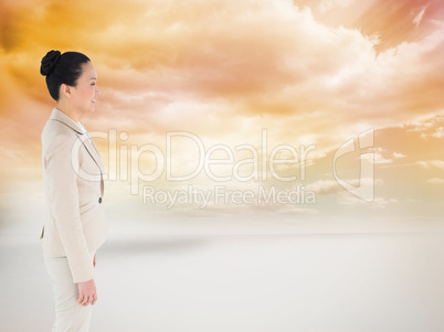 Composite image of smiling asian businesswoman