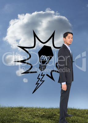 Composite image of serious asian businessman