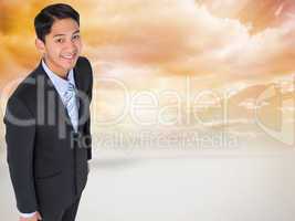 Composite image of smiling asian businessman