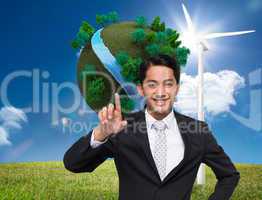 Composite image of smiling asian businessman pointing