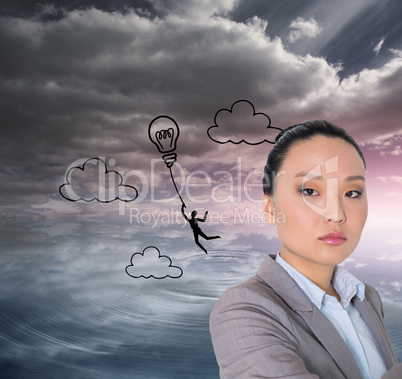 Composite image of unsmiling asian businesswoman pointing