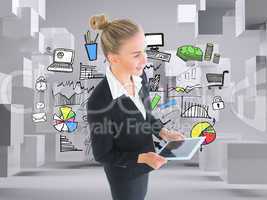 Composite image of businesswoman holding new tablet