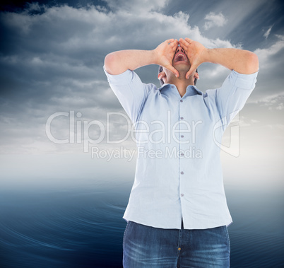 Composite image of shouting casual man standing