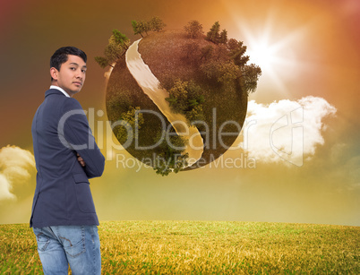 Composite image of unsmiling casual businessman with arms crosse