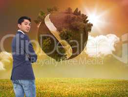 Composite image of unsmiling casual businessman with arms crosse