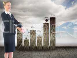 Composite image of businesswoman holding pink piggy bank