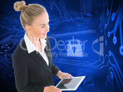 Composite image of businesswoman holding new tablet