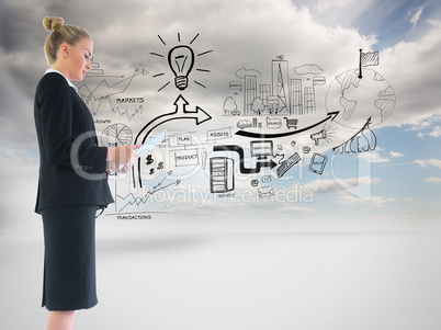 Composite image of businesswoman holding new tablet