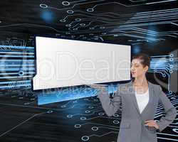 Composite image of businesswoman holding tablet computer