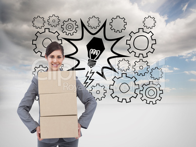 Composite image of smiling businesswoman carrying cardboard boxe