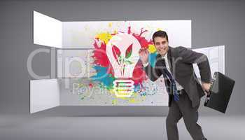 Composite image of happy businessman in a hury