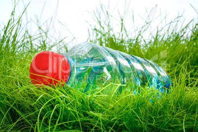 water bottle on the grass