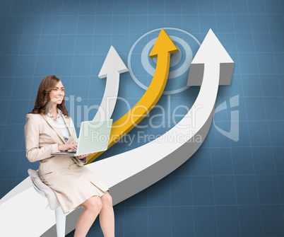 Composite image of smiling businesswoman sitting and using lapto