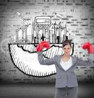 Composite image of businesswoman with boxing gloves