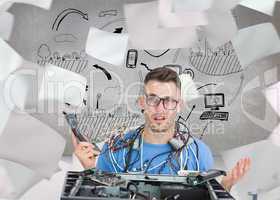 Composite image of confused it professional with cables and phon