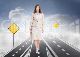 Composite image of smiling businesswoman walking