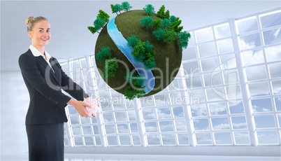 Composite image of businesswoman holding pink piggy bank