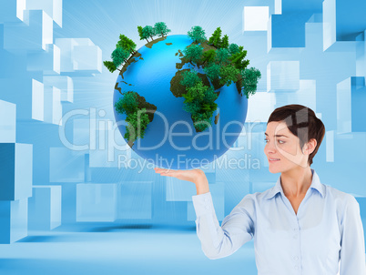 Composite image of businesswoman with an open hand to show a cop